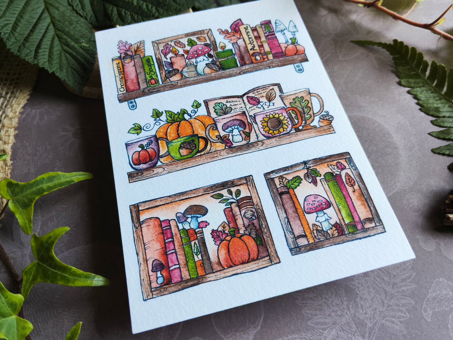 Carte Bibliothèque Automnale – Livres, Citrouilles et Maisons Douillettes