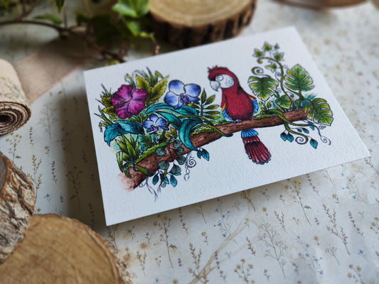 Carte A6 Oiseau Perroquet Ara sur branche fleurie – Aquarelle nature