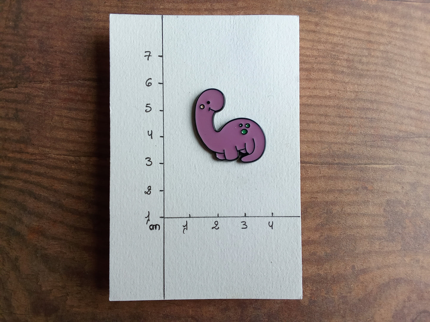 Pin's Dinosaure violet mignon animal Préhistorique