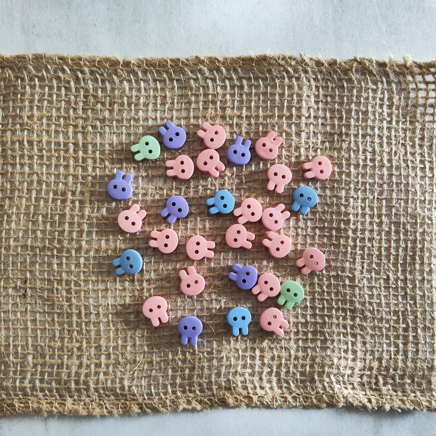 Boutons tête de lapin couleurs pastel