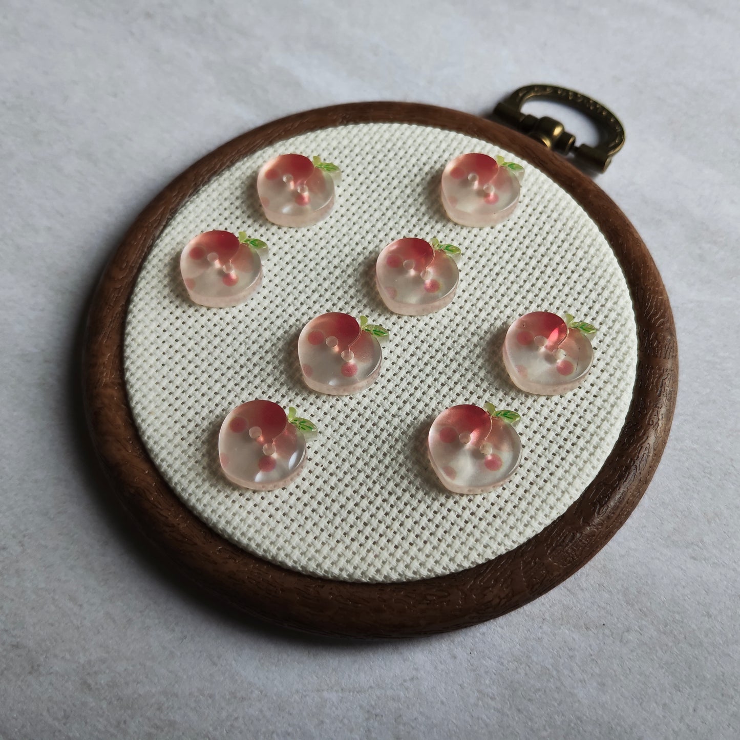 Boutons pêche nacré fruit