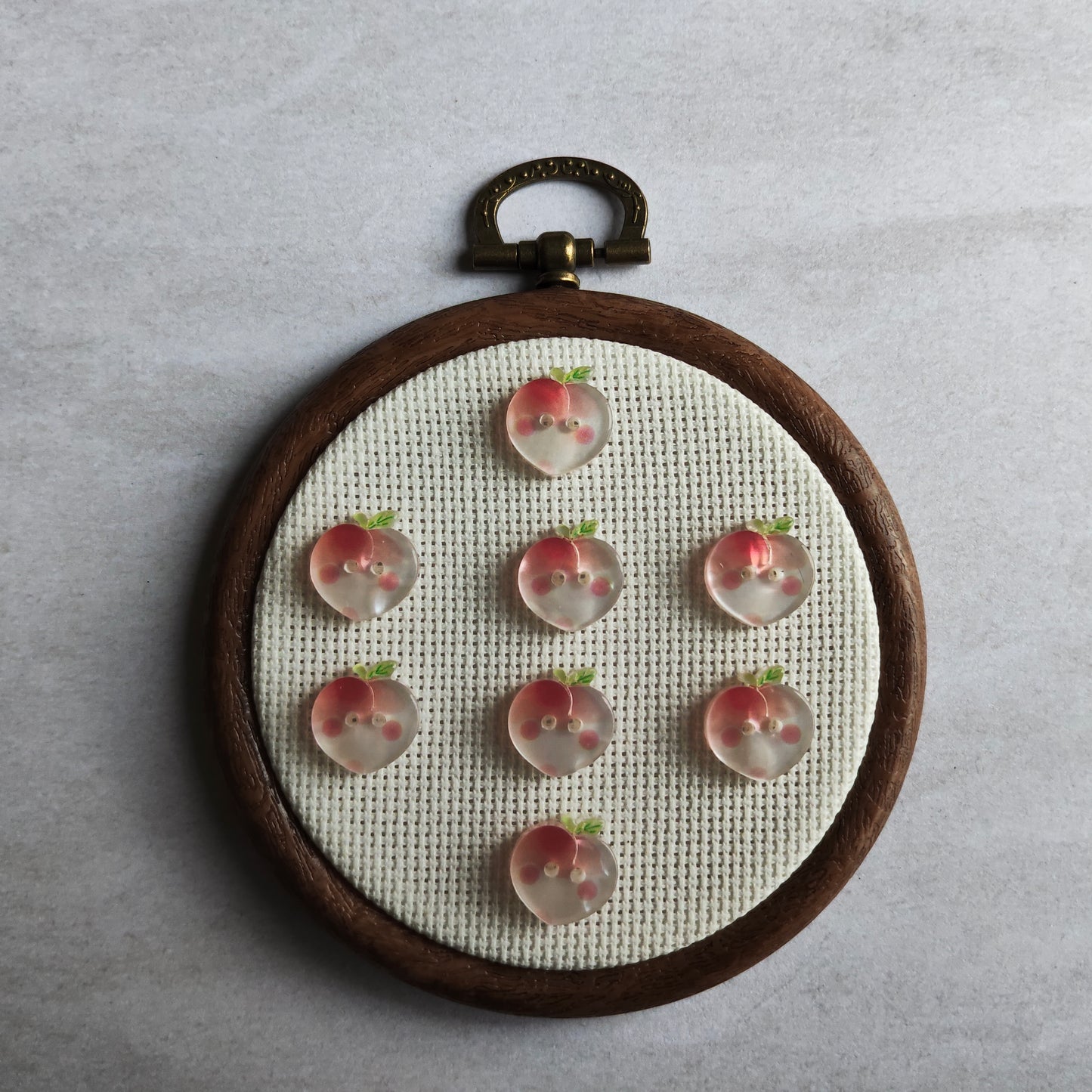 Boutons pêche nacré fruit