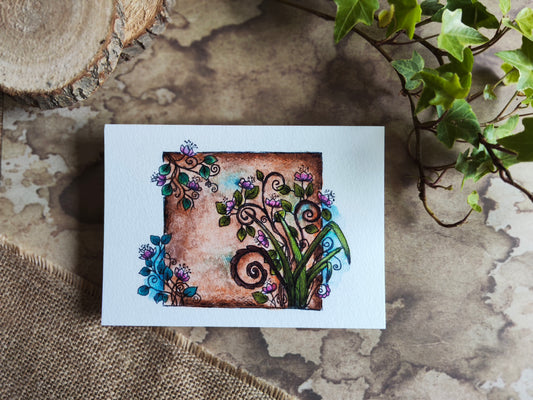 Carte florale A6 rectangle – Illustration à l’aquarelle d’un cadre ancien avec fleurs roses et feuillage, style botanique et romantique