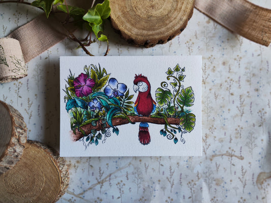 Carte A6 Oiseau Perroquet Ara sur branche fleurie – Aquarelle nature