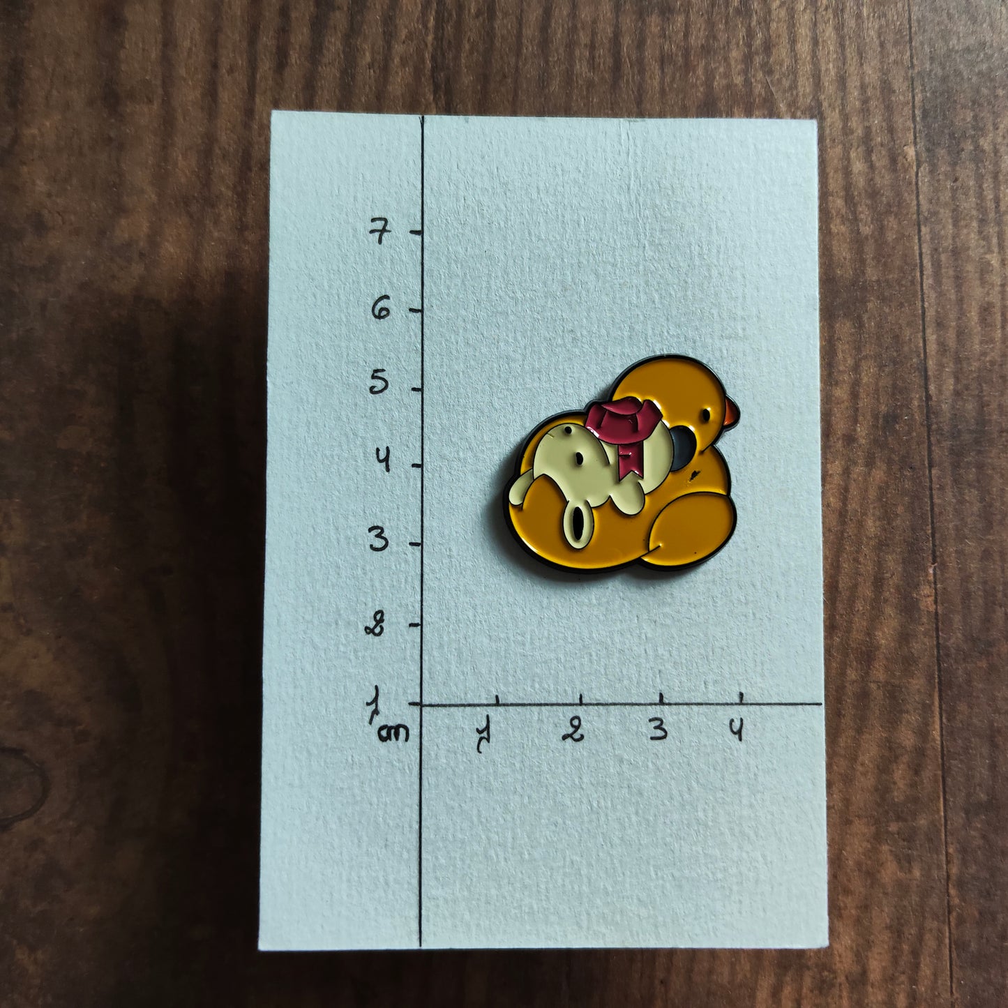 Pin's Lapin blanc et canard gonflable