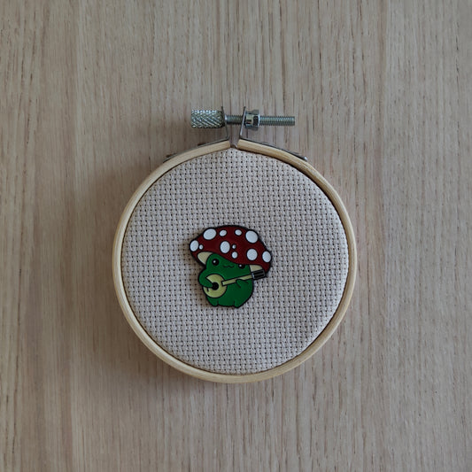 Pin's Grenouille verte chapeau champignon et guitare