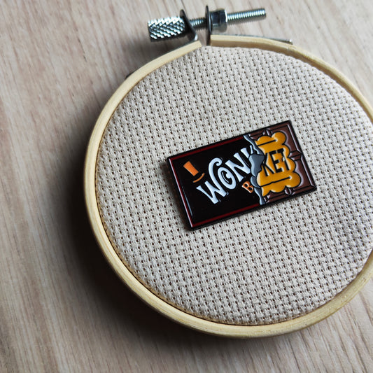 Pin's tablette de chocolat ticket d'or