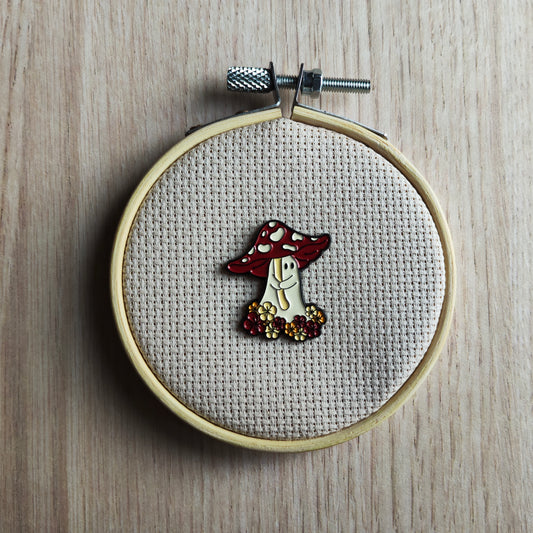 Pin's Champignon rouge fantôme et fleurs