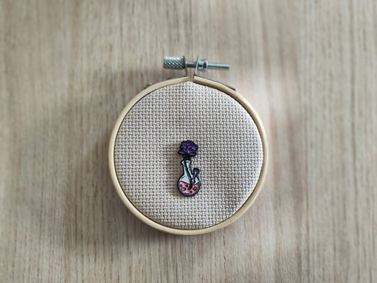Pin's fiole potion fleur rose violet